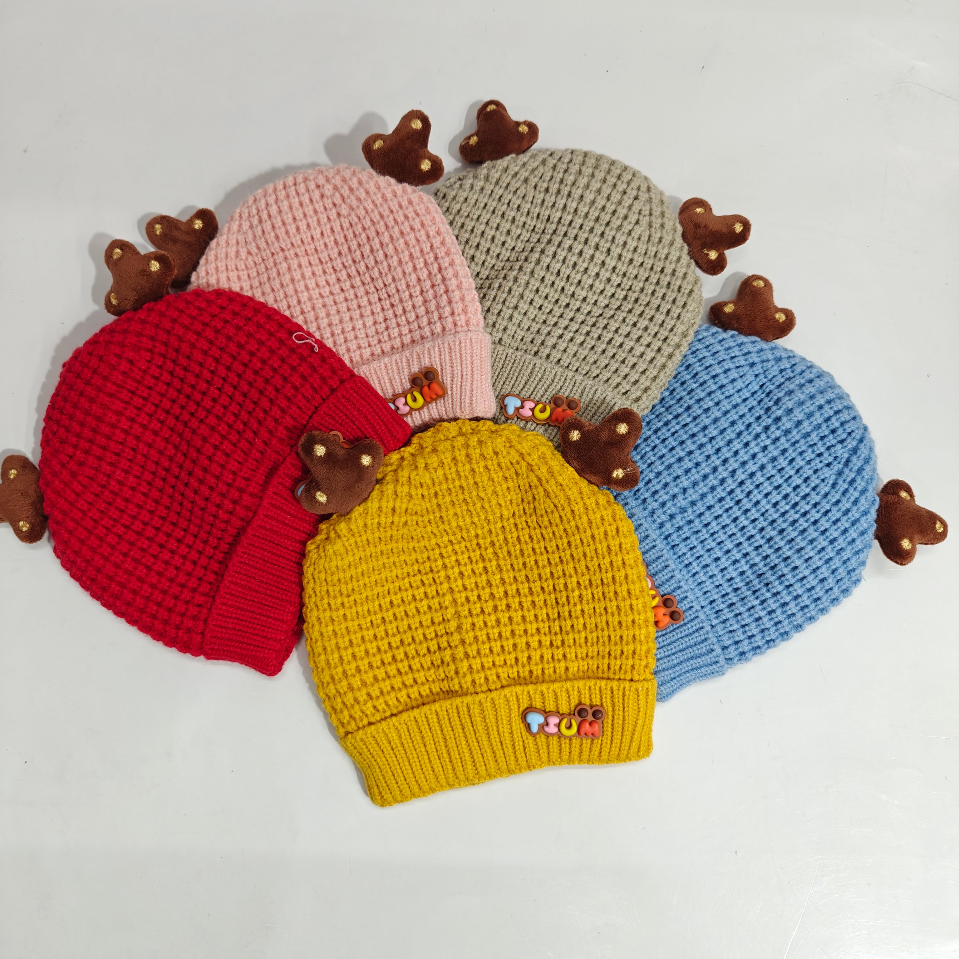 KNITTED HORN APPLIQUE WINTER CAP