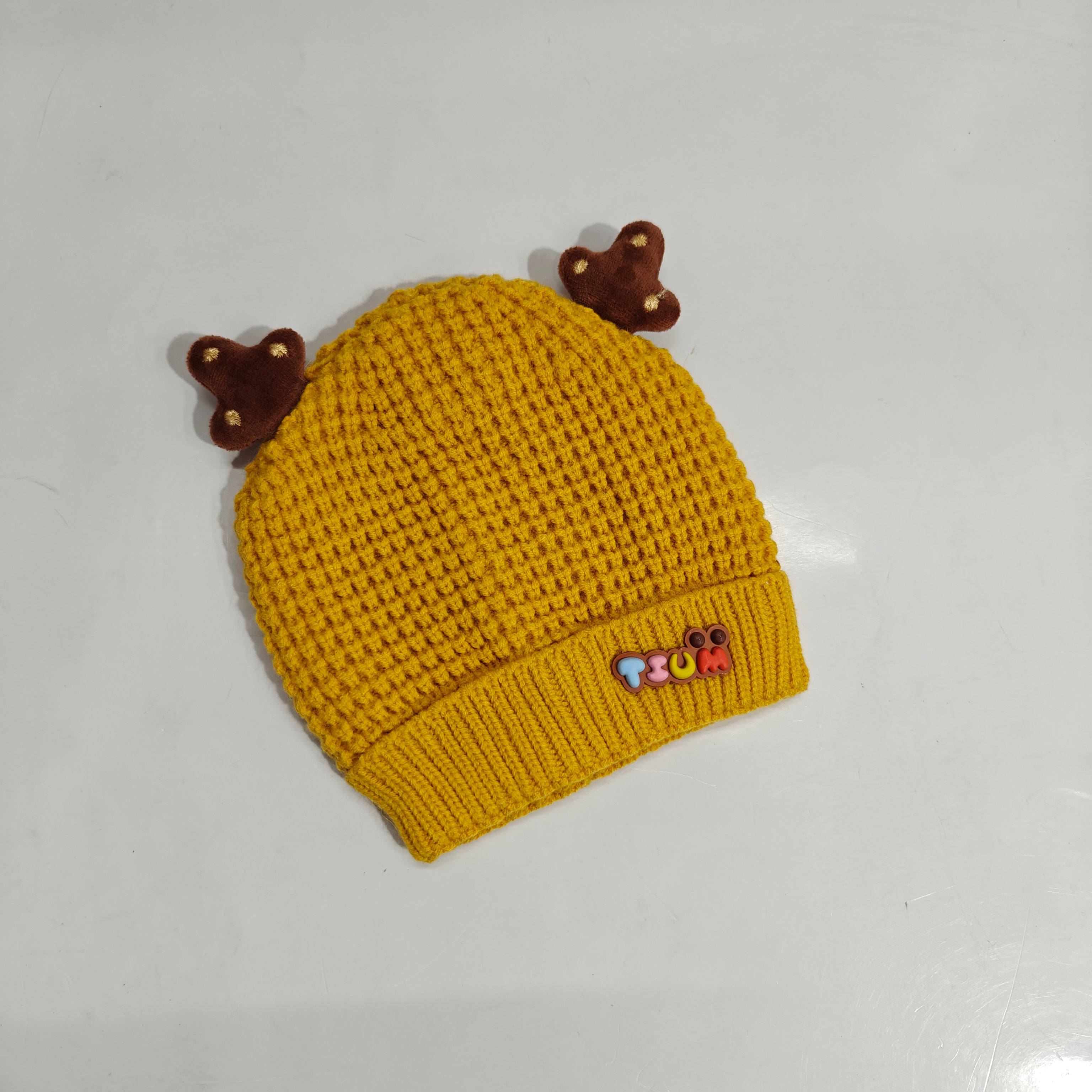KNITTED HORN APPLIQUE WINTER CAP