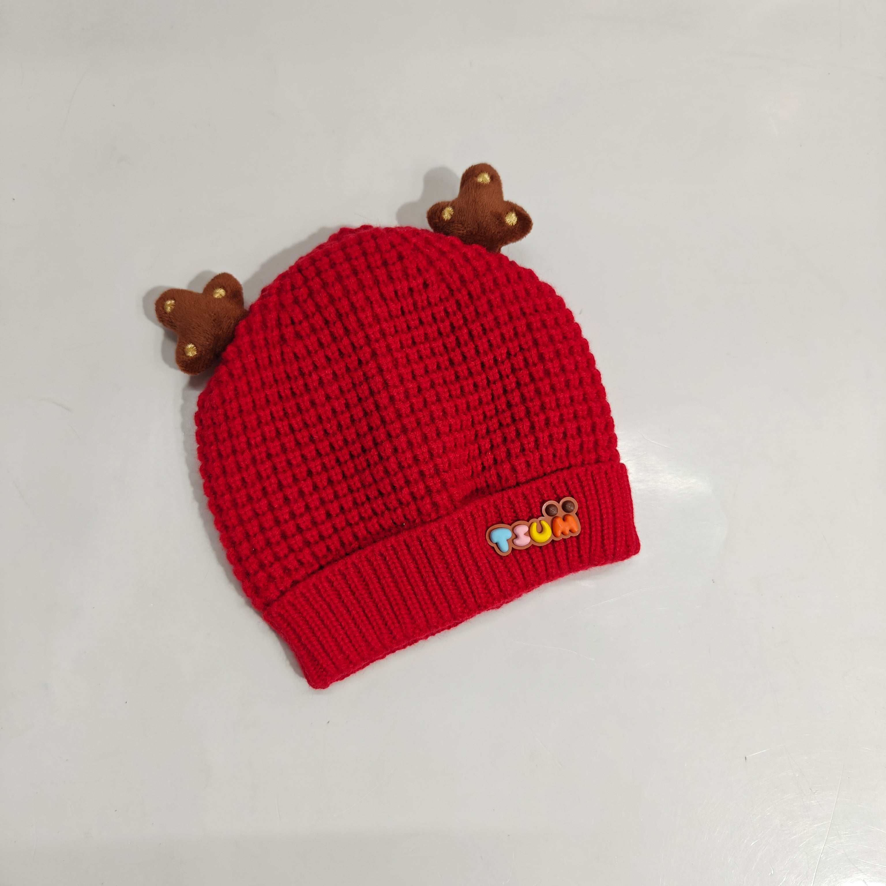 KNITTED HORN APPLIQUE WINTER CAP
