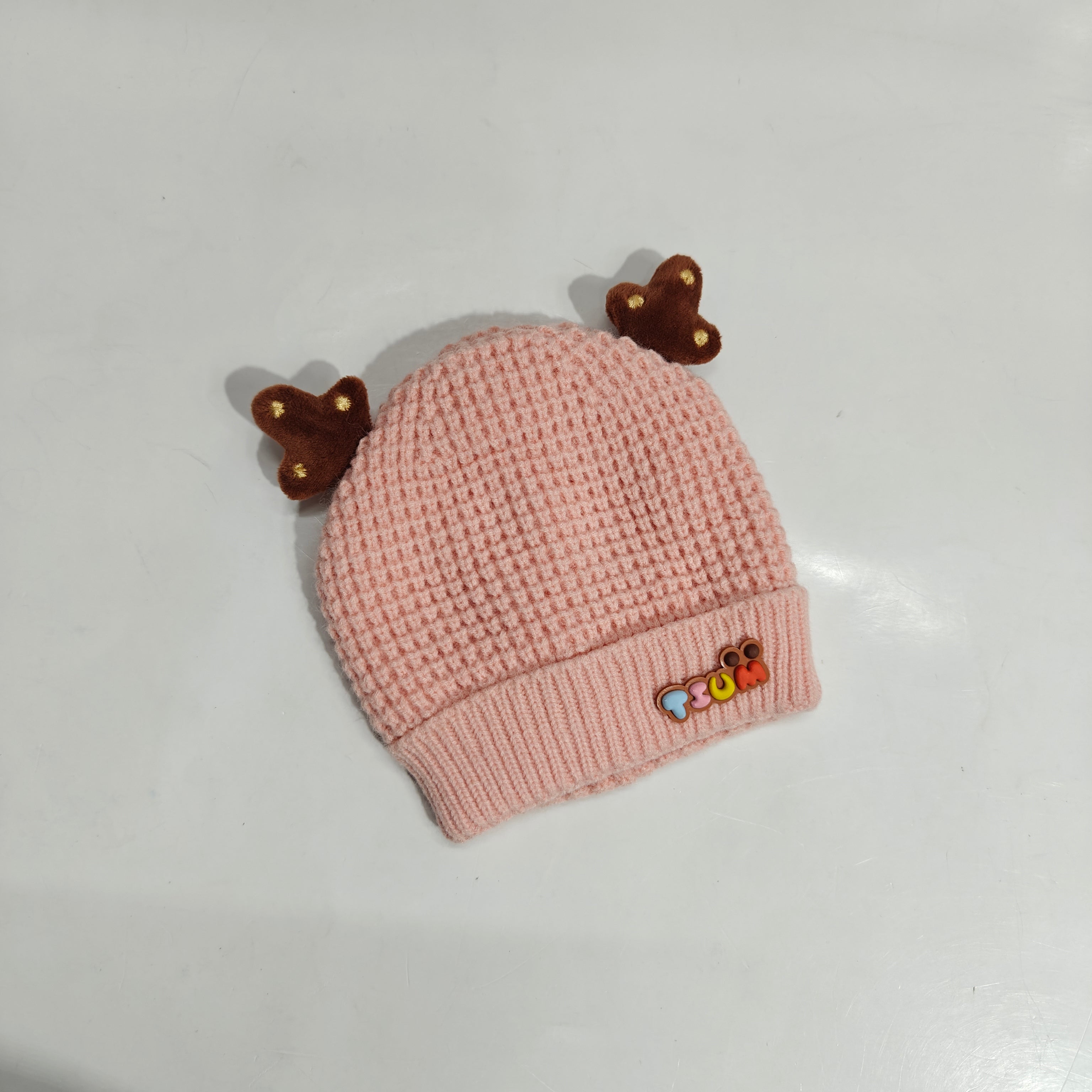 KNITTED HORN APPLIQUE WINTER CAP