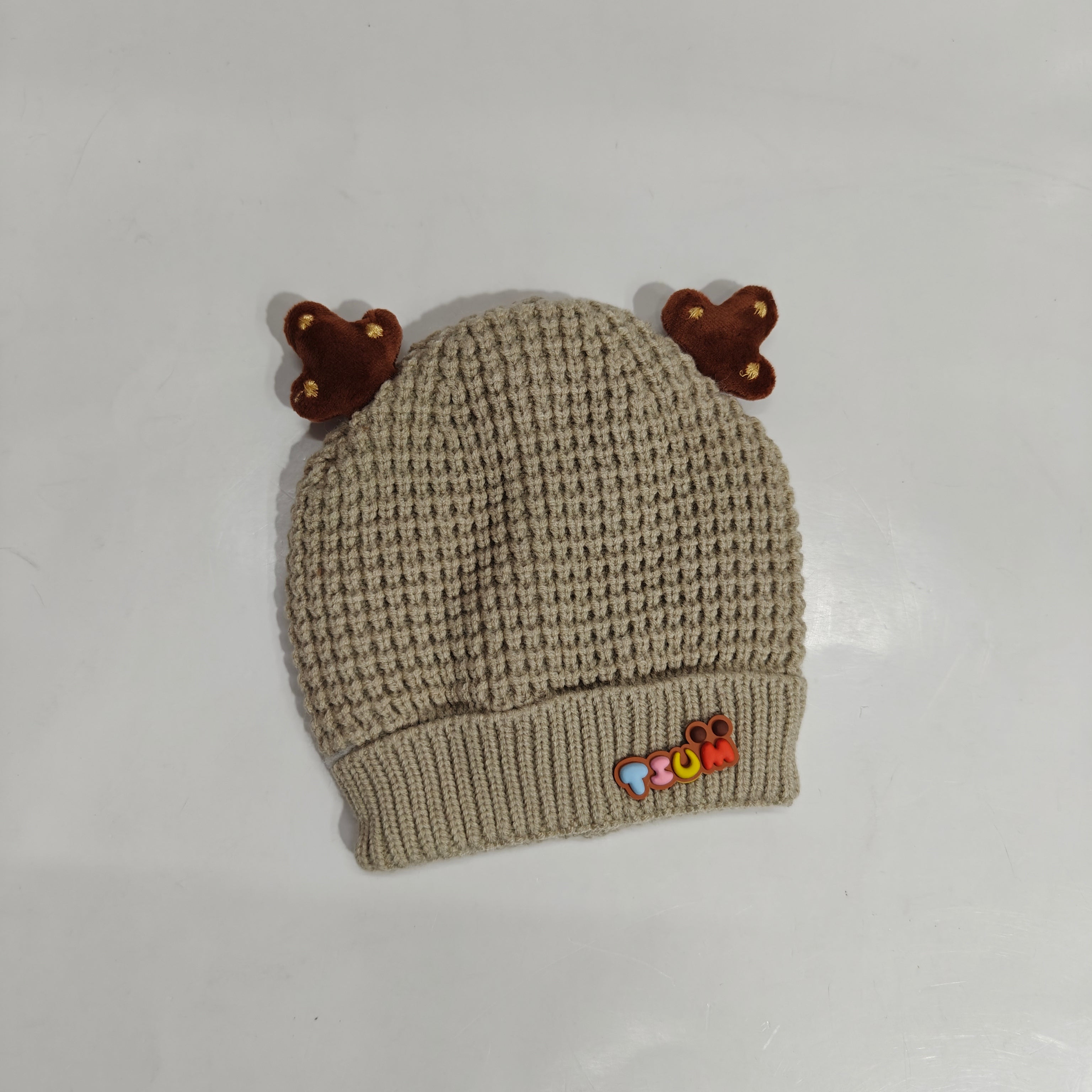 KNITTED HORN APPLIQUE WINTER CAP