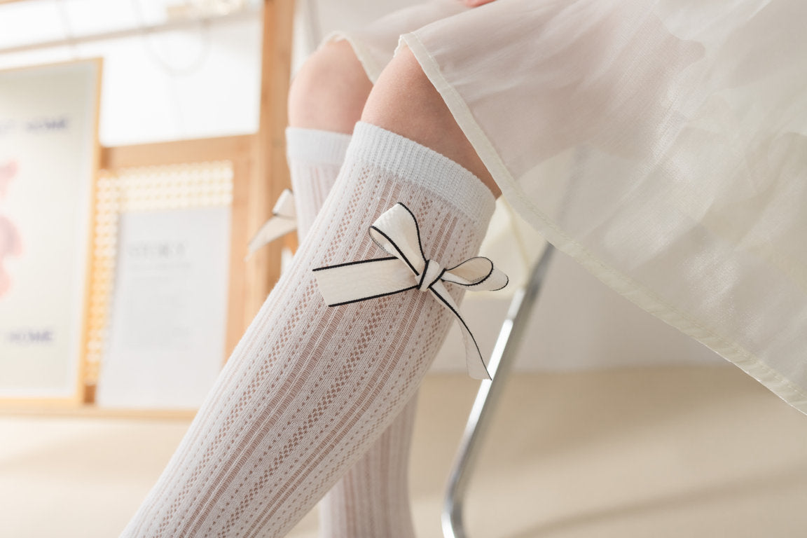 SOLID BOW KNEE LENGTH SOCKS