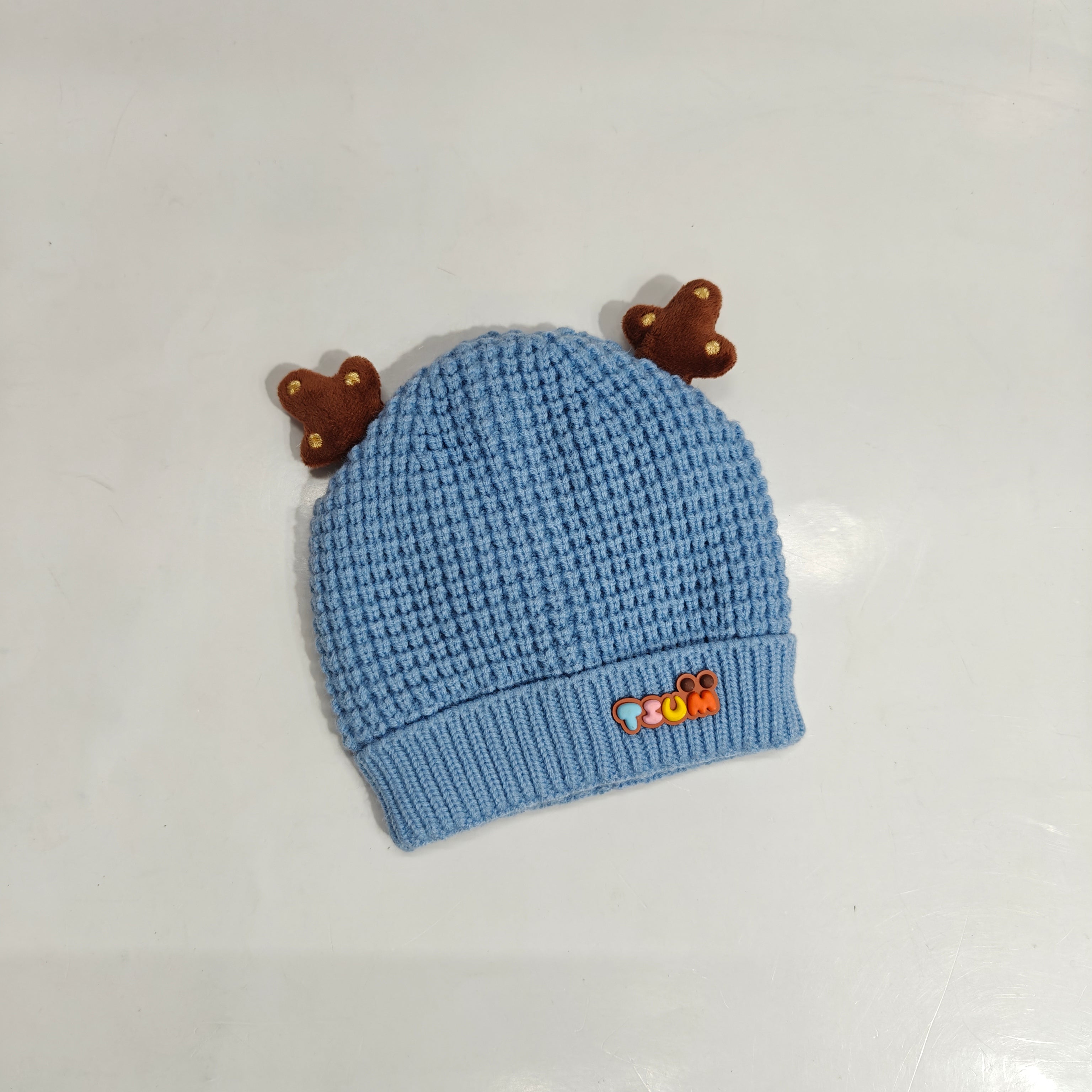 KNITTED HORN APPLIQUE WINTER CAP