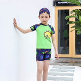 DINO PRINT 2 PIECE SWIMSUIT WITH CAP - GREEN
