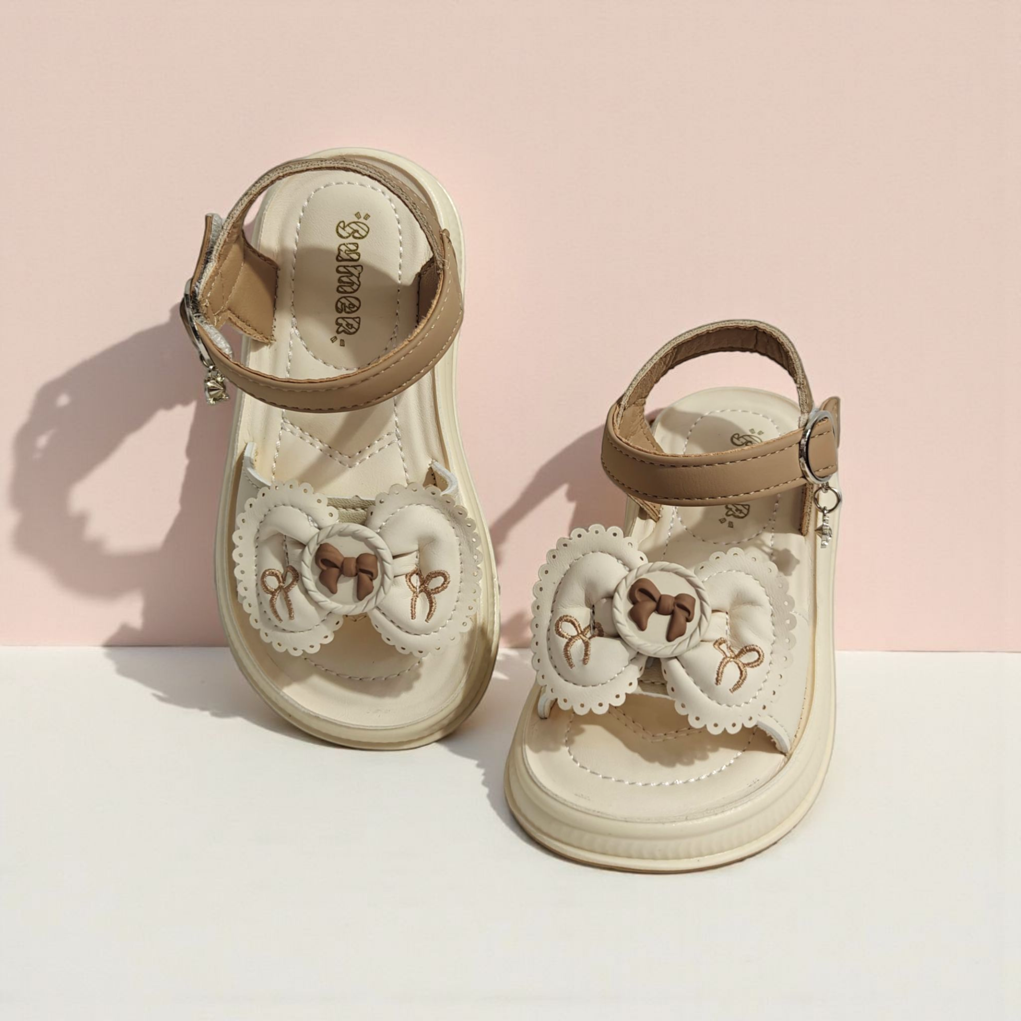 BOW APPLIQUE SANDALS - BEIGE