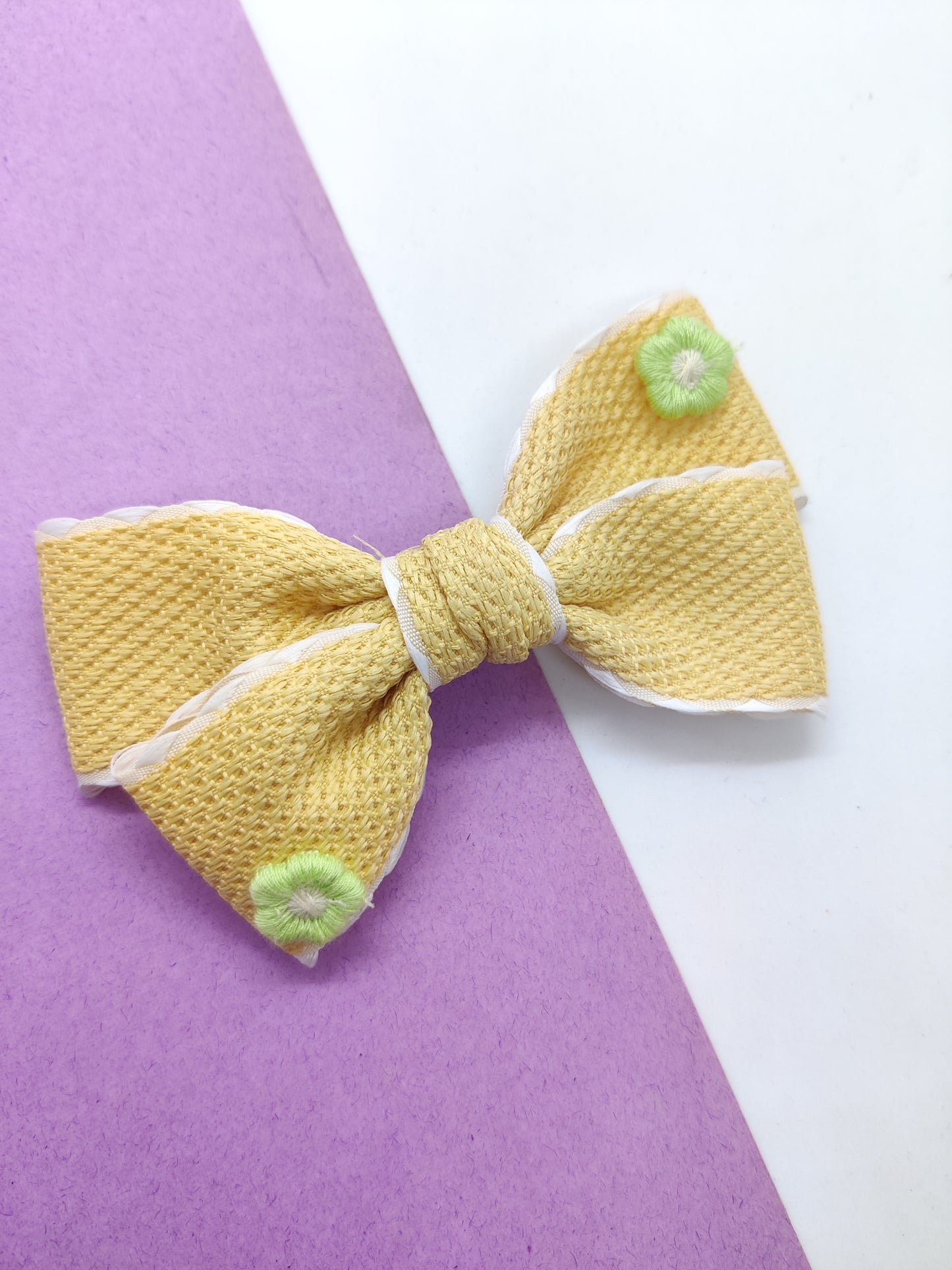 WEAVE IN TEXTURED HANDCRAFTED BOWS