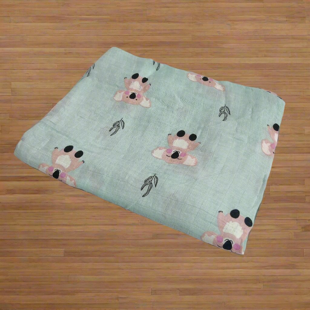 KAMOLA PRINT MUSLIN SWADDLE - SEA GREEN