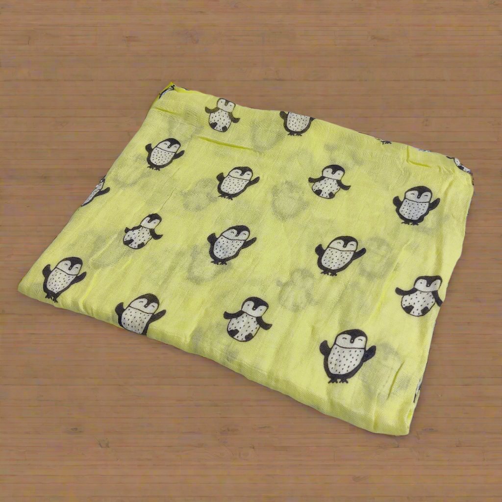 PANGUIN PRINT MUSLIN SWADDLE - YELLOW