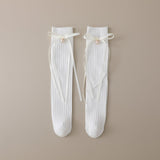 RIBBONED KNOT DETAILED PEARL APPLIQUE KNEE LENGTH SOCKS